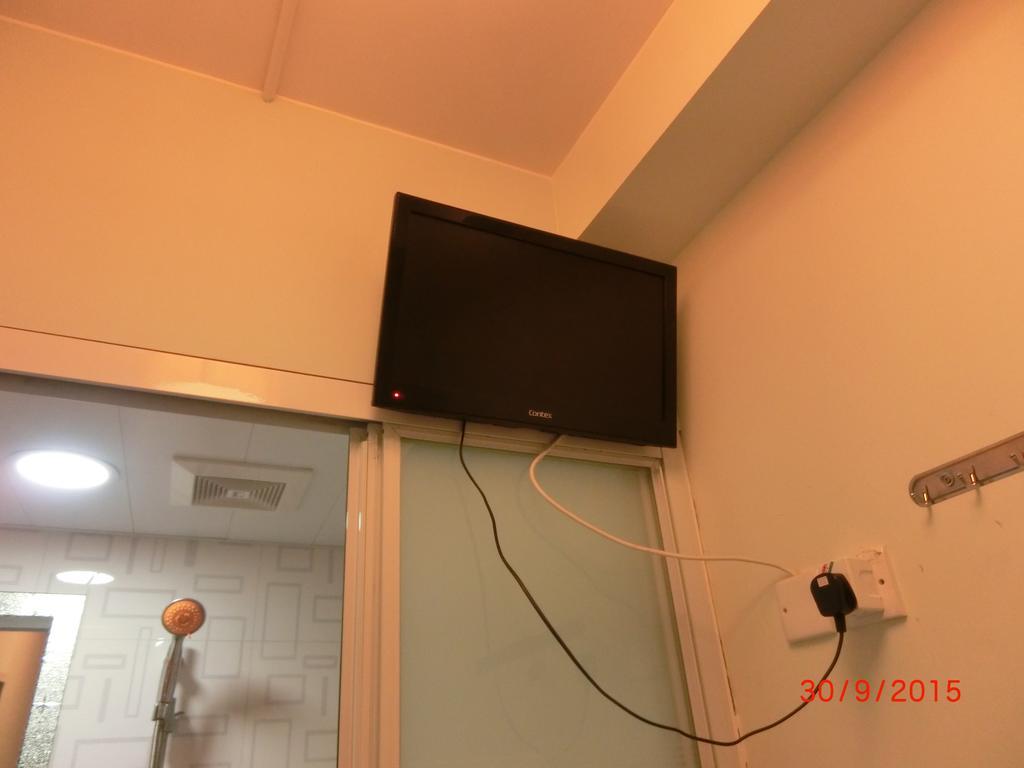 Li Cheng Guesthouse Гонконг Номер фото