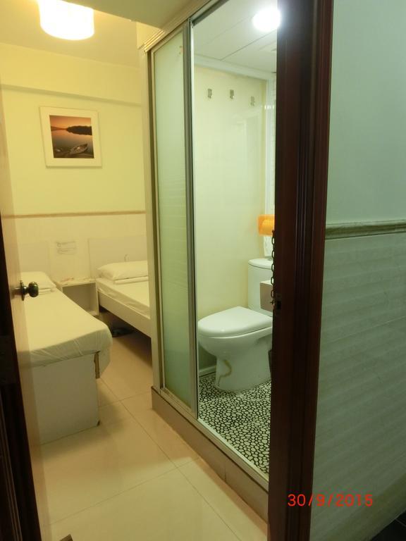 Li Cheng Guesthouse Гонконг Номер фото