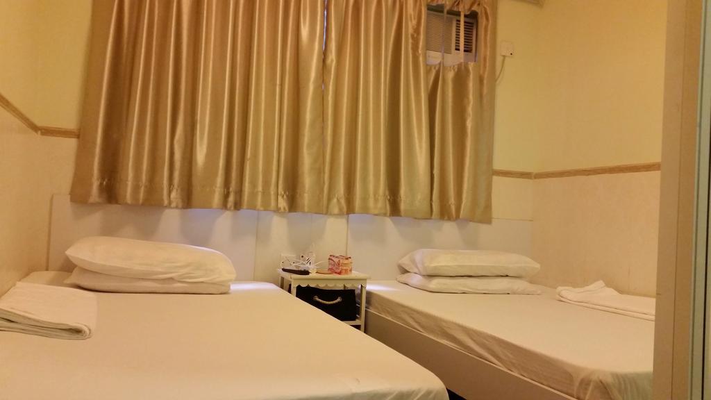 Li Cheng Guesthouse Гонконг Номер фото